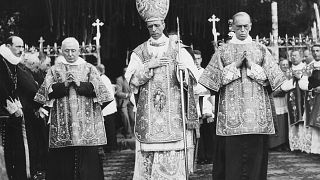 Pope Pius XII (centre) pictured in an undated file photo