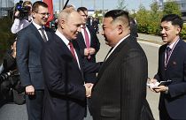 Russian President Vladimir Putin and North Korea's leader Kim Jong Un shake hands during their meeting at the Vostochny cosmodrome outside Tsiolkovsky on 13 September