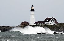 Waves crash against the rocks at Portland Head Light, Saturday, Sept. 15, 2023, in South Portland, Maine.