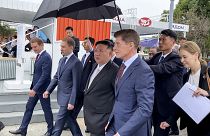In this photo released by Government of the Russian far eastern region of Primorsky Krai, North Korea's leader Kim Jong Un with Russian officials in Vladivostok, Russia Sept.