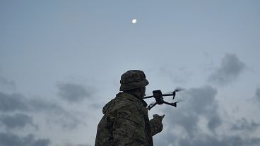 A soldier launches a drone near Bakhmut, Ukraine, Sept. 3, 2023