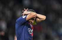 PSG's Kylian Mbappe reacts after missing a scoring chance during the French League One soccer match between Paris Saint Germain and Nice at Parc des Princes stadium in Paris, 