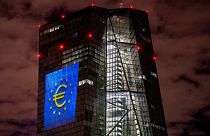 A light installation is projected onto the building of the European Central Bank during a rehearsal in Frankfurt, Germany, Thursday, Dec. 30, 2021.