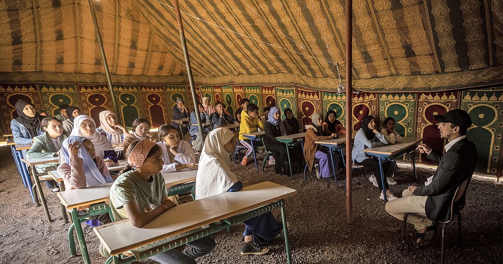 Moroccan children walk long distances to tent school following earthquake