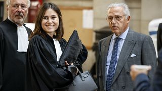 Guy Wildenstein (right) arrives at an appeals court in Paris for a new trial into tax fraud and money laundering.