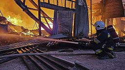 FILE - emergency services personnel work to extinguish a fire following a Russian attack in Lviv, Ukraine, Tuesday, Sept. 19, 2023. 