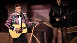 Sufjan Stevens has revealed his rare diagnosis this week - pictured here with St. Vincent, right, performing 'Mystery of Love' at the 2018 Oscars 