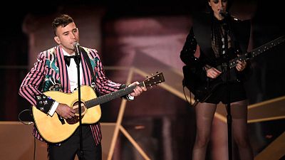 Sufjan Stevens has revealed his rare diagnosis this week - pictured here with St. Vincent, right, performing 'Mystery of Love' at the 2018 Oscars 