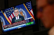 A press conference by Federal Reserve chairman Jerome Powell is displayed on the floor at the New York Stock Exchange in New York, Wednesday, Sept. 20, 2023.