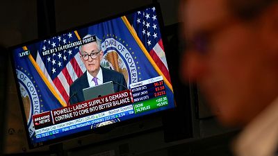 A press conference by Federal Reserve chairman Jerome Powell is displayed on the floor at the New York Stock Exchange in New York, Wednesday, Sept. 20, 2023.