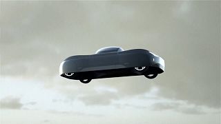 A imagem mostra uma representação concetual do protótipo do carro voador Modelo A da Alef Aeronautics.