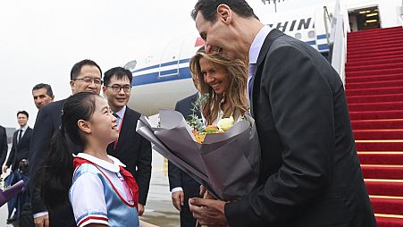 Suriye lideri Beşşar Esad, eşi Esma Esad ile birlikte Asya Oyunları'nın açılış törenlerine katılmak üzere Çin'de 