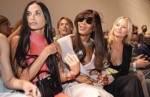 From left, Demi Moore, Naomi Campbell and Kate Moss attend the Fendi women's Spring Summer 2024 fashion show in Milan, Italy, Sept. 20, 2023