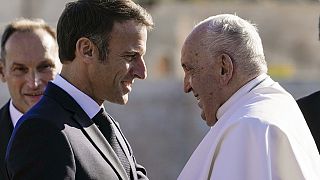 Pope Francis is welcomed by French President Emmanuel Macron as arrives at the final session of the "Rencontres Mediterraneennes" meeting at the Palais du Pharo, in Marseille.
