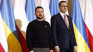 Polonya Başbakanı Mateusz Morawiecki ve Ukrayna devlet Başkanı Volodimir Zelenskiy (solda)