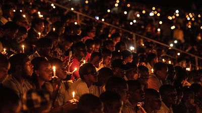 People hold candles during a commemoration ceremony of the 1994 Rwandan genocide in 2019
