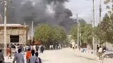 In this grab taken from a video, smoke billows after an explosion at a security checkpoint in the central Somalian city of Beledweyne