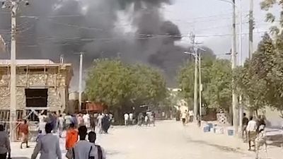 In this grab taken from a video, smoke billows after an explosion at a security checkpoint in the central Somalian city of Beledweyne