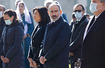 Armenia's Prime Minister Nikol Pashinian, centre, and his wife Anna Akobian, left of him, in 2020.