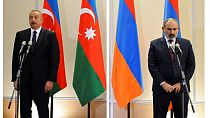 Presidente do Azerbaijão, Ilham Aliyev, à esquerda, e o primeiro-ministro da Arménia, Nikol Pashinyan, ni final de uma reunião em Sochi, na Rússia em 2021