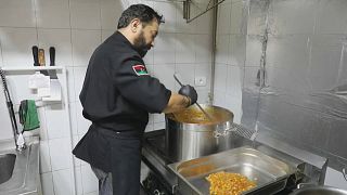 Libya flood: Cook Salah Khalil alongside volunteers prepare meals for the displaced 