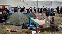 Migrants sleeping in tents