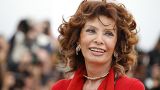 Italian actress Sophia Loren smiles during a photo call for "Human Voice," (Voce Umana) at the 67th Cannes Film Festival in 2014.