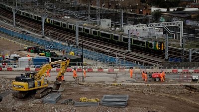 A train passes the construction site of the High Speed 2 (HS2) rail line at Euston station in London, 11 February 2020.