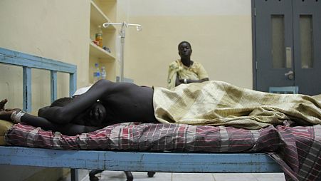 شانغكوث سينشوت، طفل مصاب في مستشفى جوبا التعليمي جنوب السودان. 