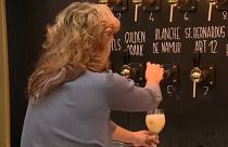 Beer is poured from the tap at Belgian Beer World.