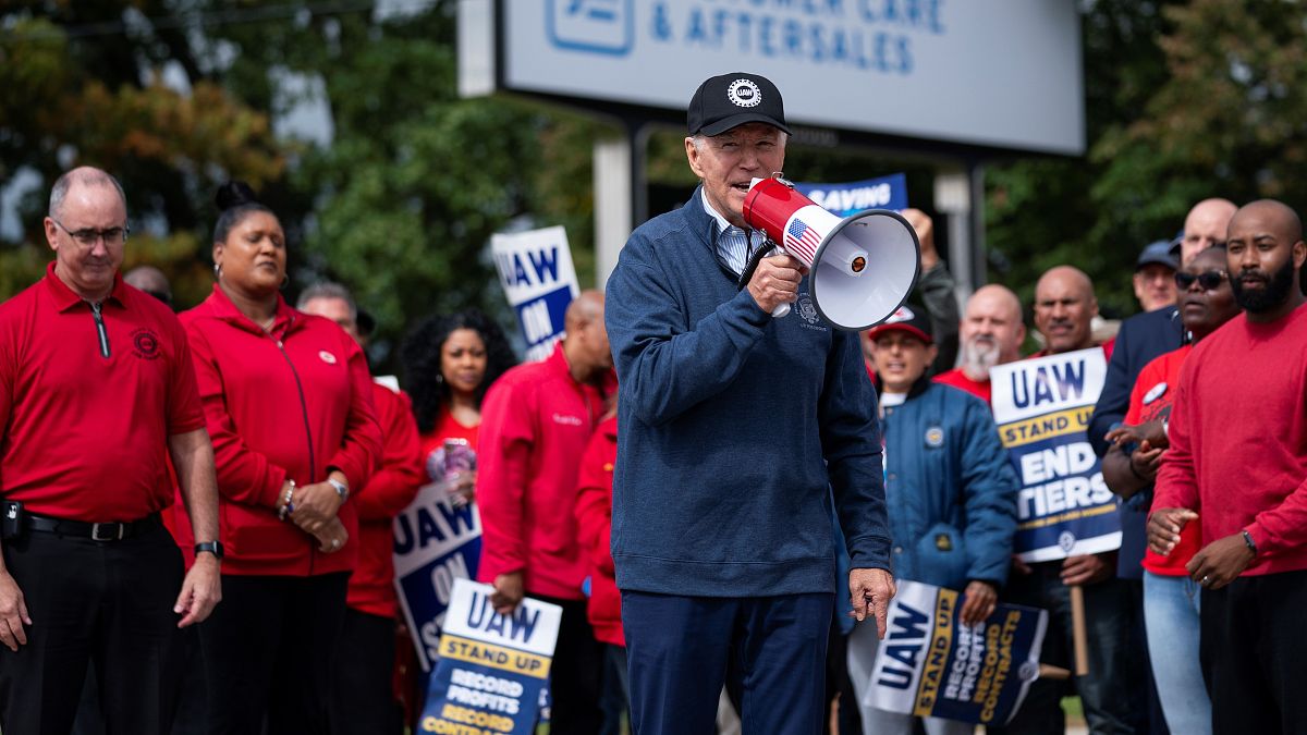 Biden urges striking auto workers to 'stick with it' in picket line visit unparalleled in history, Sep 26, 2023
