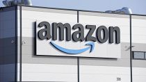 An Amazon company logo marks the facade of a building in Schoenefeld near Berlin, March 18, 2022. 
