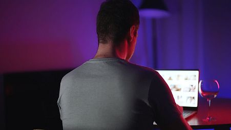 A man looking at pornographic websites.