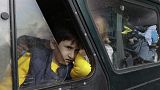 An ethnic Armenian boy from Nagorno-Karabakh, looks out from a car upon his arrival in Goris, the town in Syunik region, Armenia, Sept. 25, 2023. 
