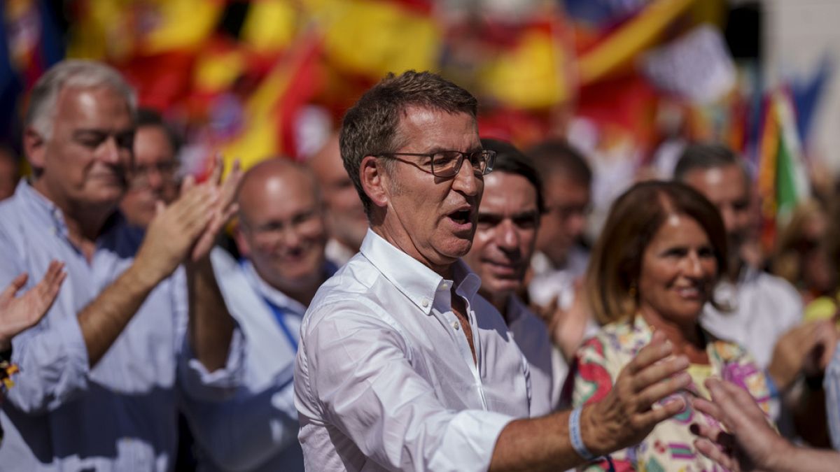 Alberto Feijoo, leader of the mainstream conservative Popular Party, waves during a rally in Madrid, Spain, Sunday, 24 September 2023. 