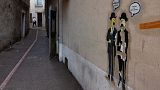 Les Dupont peints sur un mur