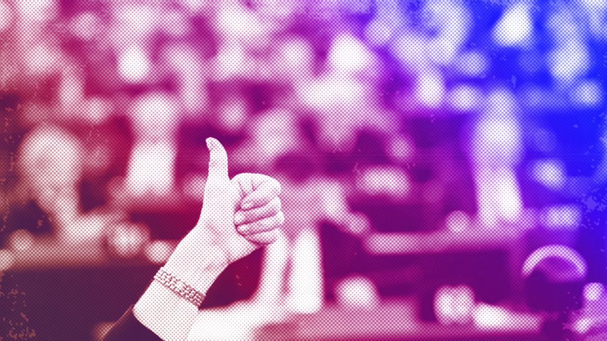 A member of the European Parliament gives a thumbs up while taking part in a vote during a plenary session in Strasbourg, January 2017