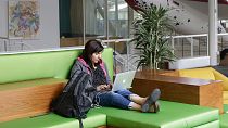 A Google employee works on her computer at a Google campus building in Mountain View, California, 2013.