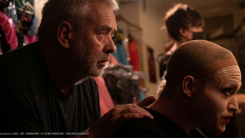 Luc Besson and Caleb Landry Jones on the set of Dogman