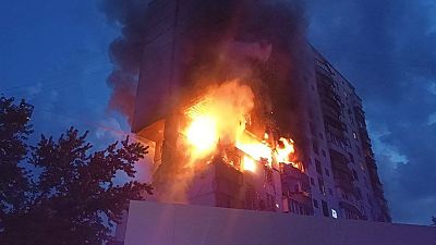 FILE - A fire is seen following an explosion caused by a gas leak in a 16-story residential building in Kyiv, Ukraine, Thursday, June 22, 2023. 