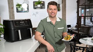 Nathan Anthony, known as the "air fryer king", at the opening of his pop-up air fryer restaurant in collaboration with eBay