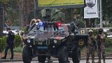 Members of Turkish Police Special Forces secure the area near the Interior Ministry following the bomb attack in Ankara