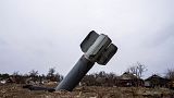 FILE - The tail of a missile sticks out in a residential area in Yahidne, near of Chernihiv, Ukraine, Tuesday, April 12, 2022.
