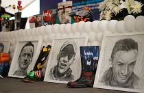Images of the 19 young people who were falsely presented as guerrillas killed in combat by the Colombian army during the country's internal conflict.