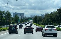 Motorists ply along the central expressway in Singapore on June 4, 2020.