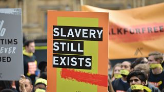 People march against modern slavery through London in 2017