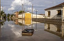 FILE - Flooded street in Sotirio village near the city of Volos, Greece, on Friday, Sept. 29, 2023. 