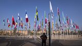 A member of the security forces stands guard outside a convention center hosting the IMF and World Bank annual meetings, in Marrakech, Morocco, Sunday, Oct. 8, 2023.