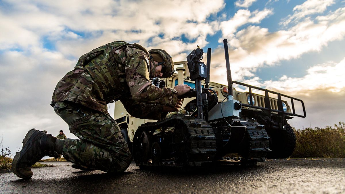 A US Air Force Explosive Ordnance Disposal (EOD) technician prepares a bomb disposal robot for zork during exercise Northern Challenge in September 2018. 