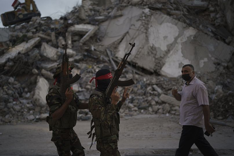جنگجویان حماس در خیابان‌های غزه در هشتم ژوئن ۲۰۲۱